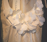 Porter des boutons�i�ȃ��[�����`�[�t�t���u���E�X�^�g��j